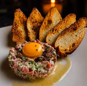 Josephine signature dishes Steak Tartare
Coq Au Vin
Duck A L'Orange